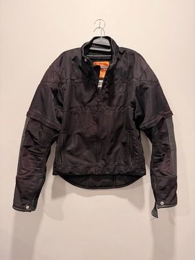 ICON Black Motorcycle Jacket with Orange Interior Label